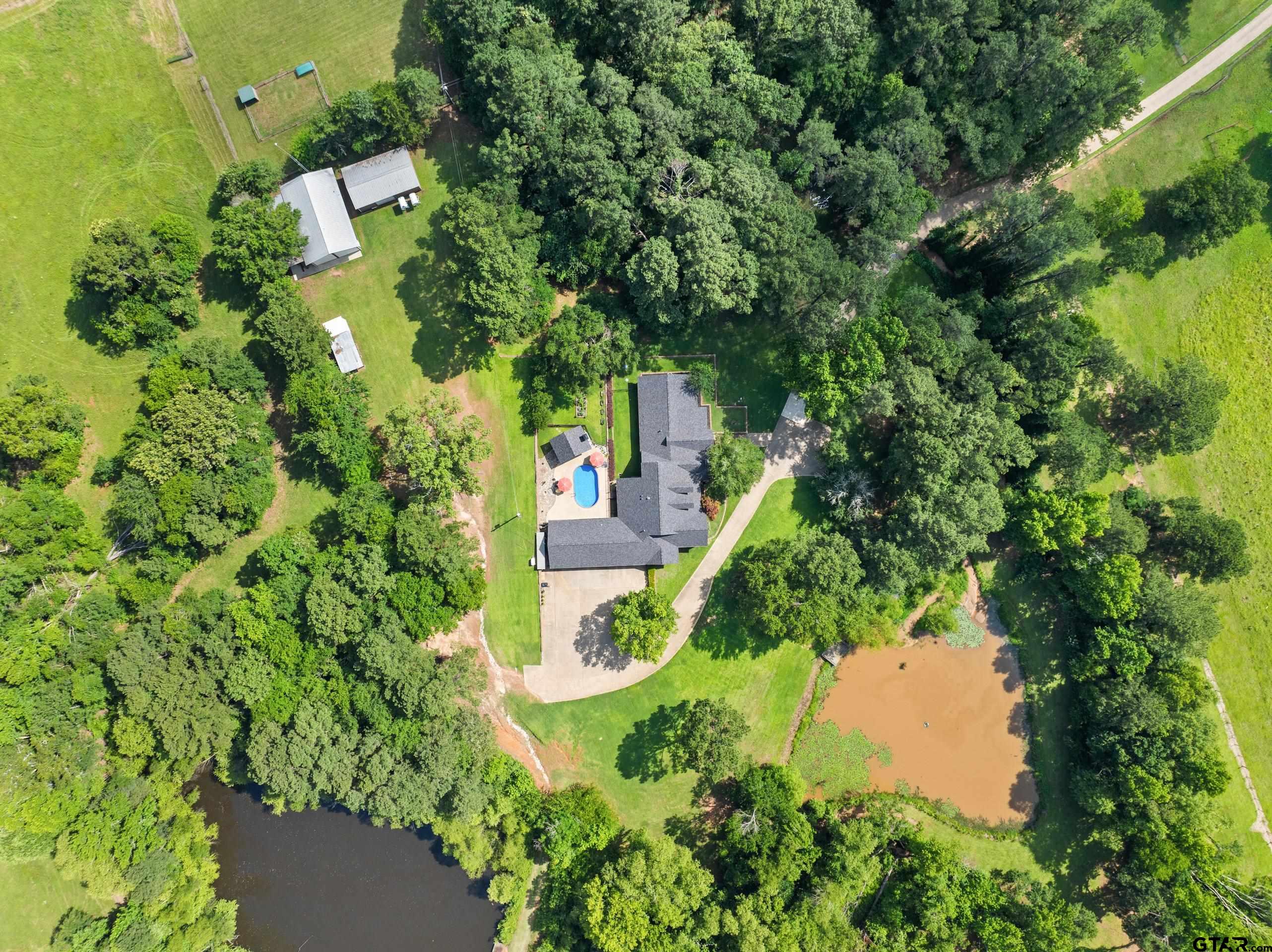19678-c R 4125 C R 4125 Lindale, TX 75771 - Photo 9 of 48 an aerial view of residential house with outdoor space and trees all around