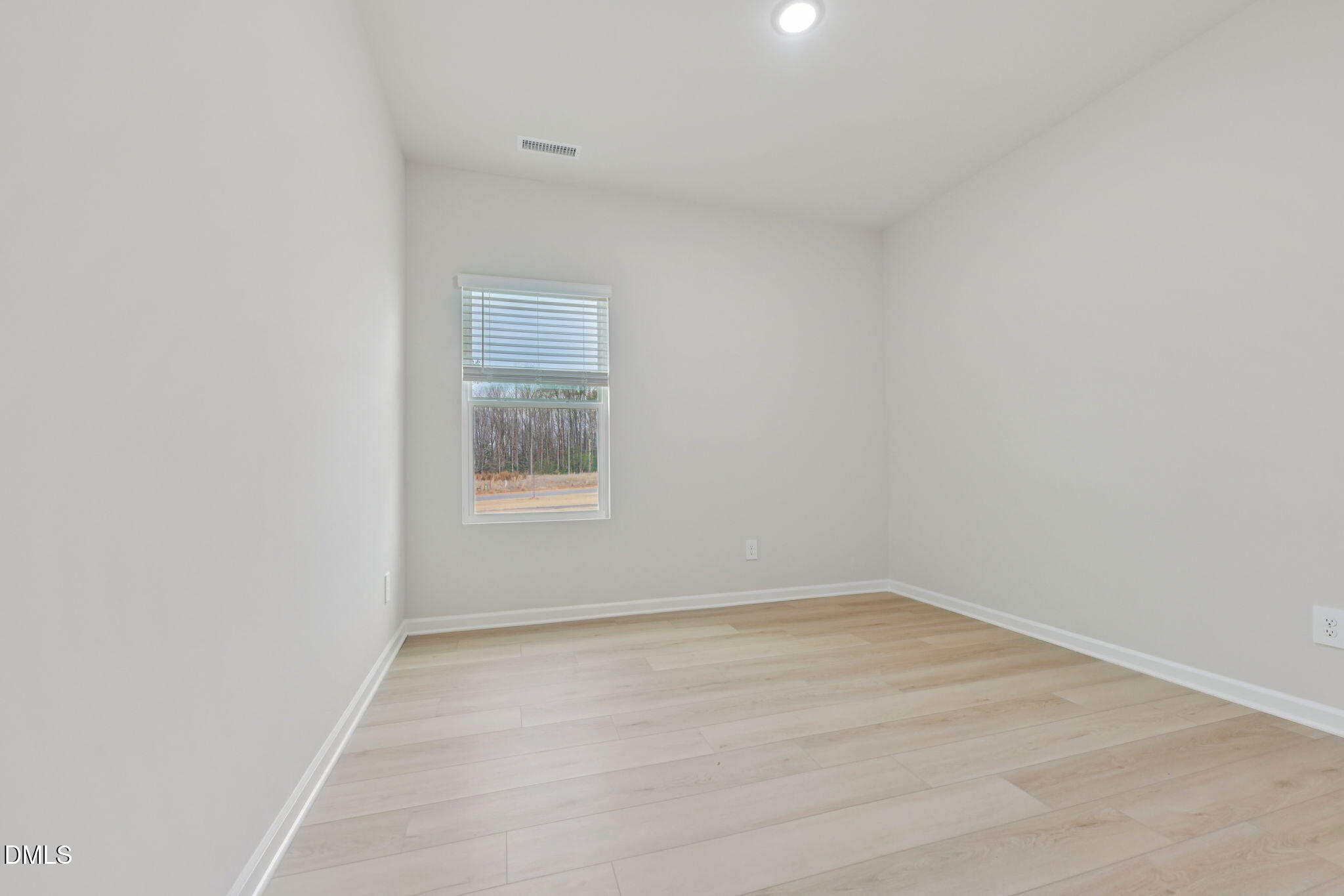 2147 Topsail Road Durham, NC 27703 - Photo 12 of 31 an empty room with a window