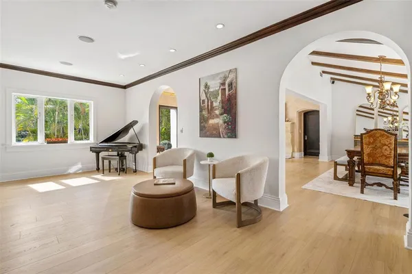 a bedroom with furniture and window