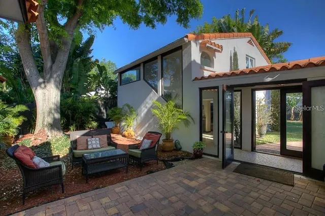 an aerial view of a house with a garden