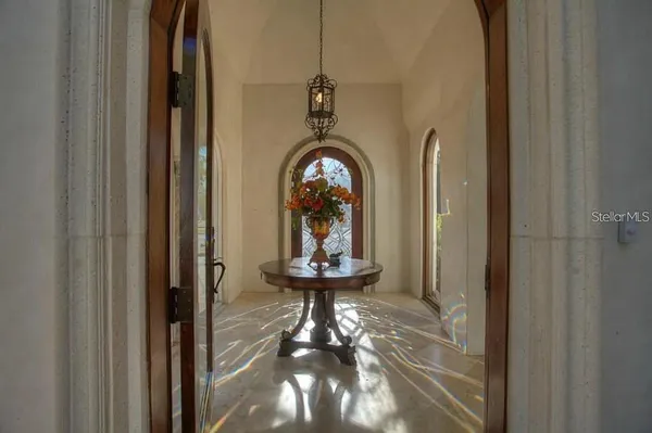 a view of gallery with wooden floor