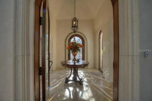 a view of gallery with wooden floor