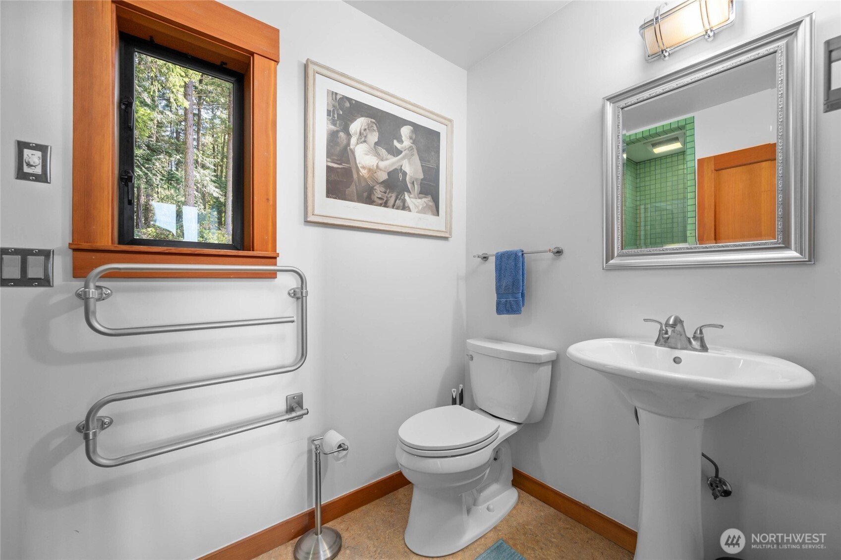 405 Northwest Thatcher Pass Road Decatur Island, WA 98221 - Photo 13 of 40 a bathroom with a toilet sink and mirror