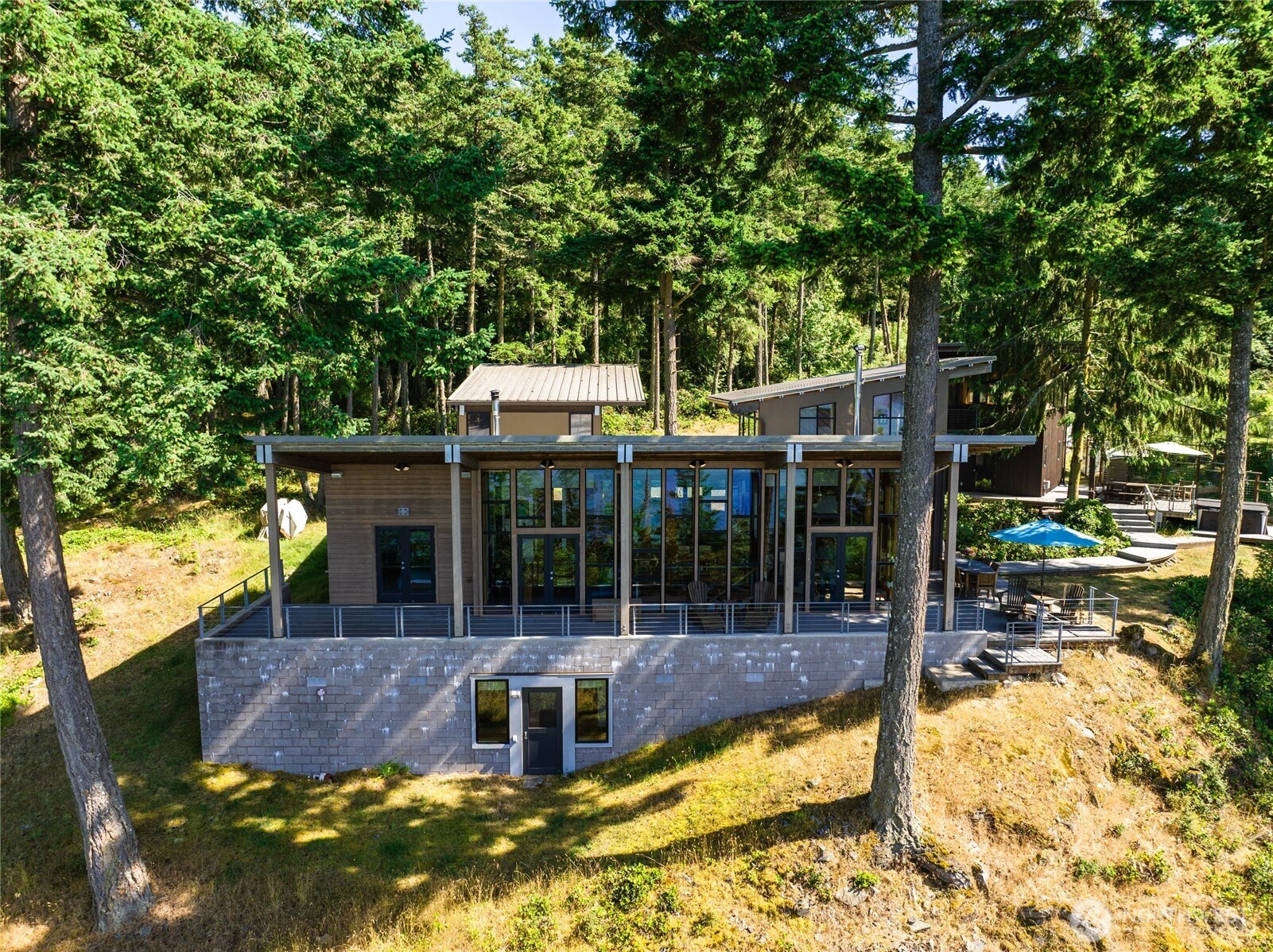 405 Northwest Thatcher Pass Road Decatur Island, WA 98221 - Photo 36 of 40 a view of a swimming pool with a patio