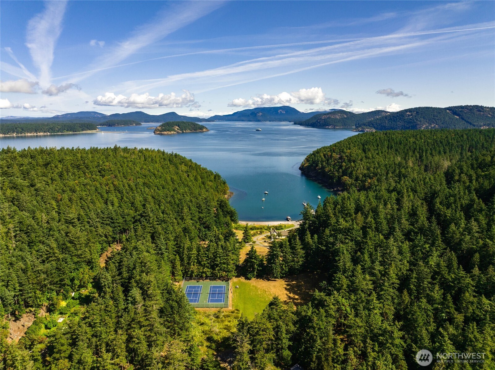 405 Northwest Thatcher Pass Road Decatur Island, WA 98221 - Photo 39 of 40 a view of a lake in middle of the green field