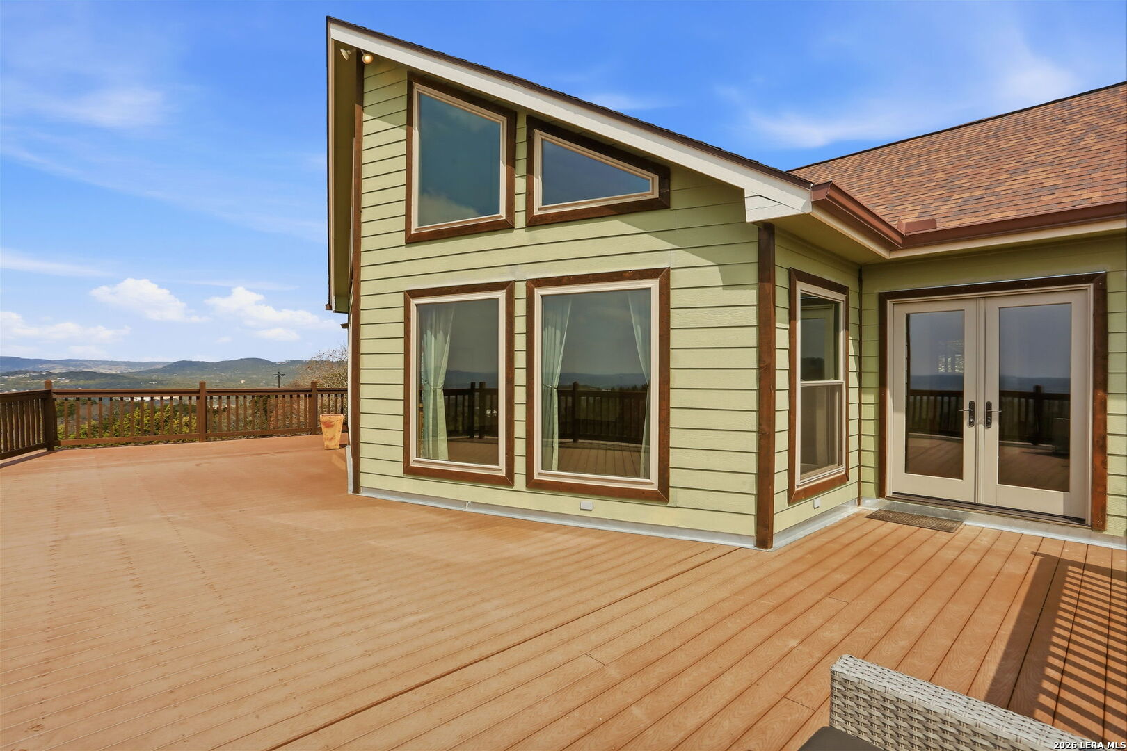 232 Doe Run Road Pipe Creek, TX 78063 - Photo 2 of 40 a view of a house with a roof deck