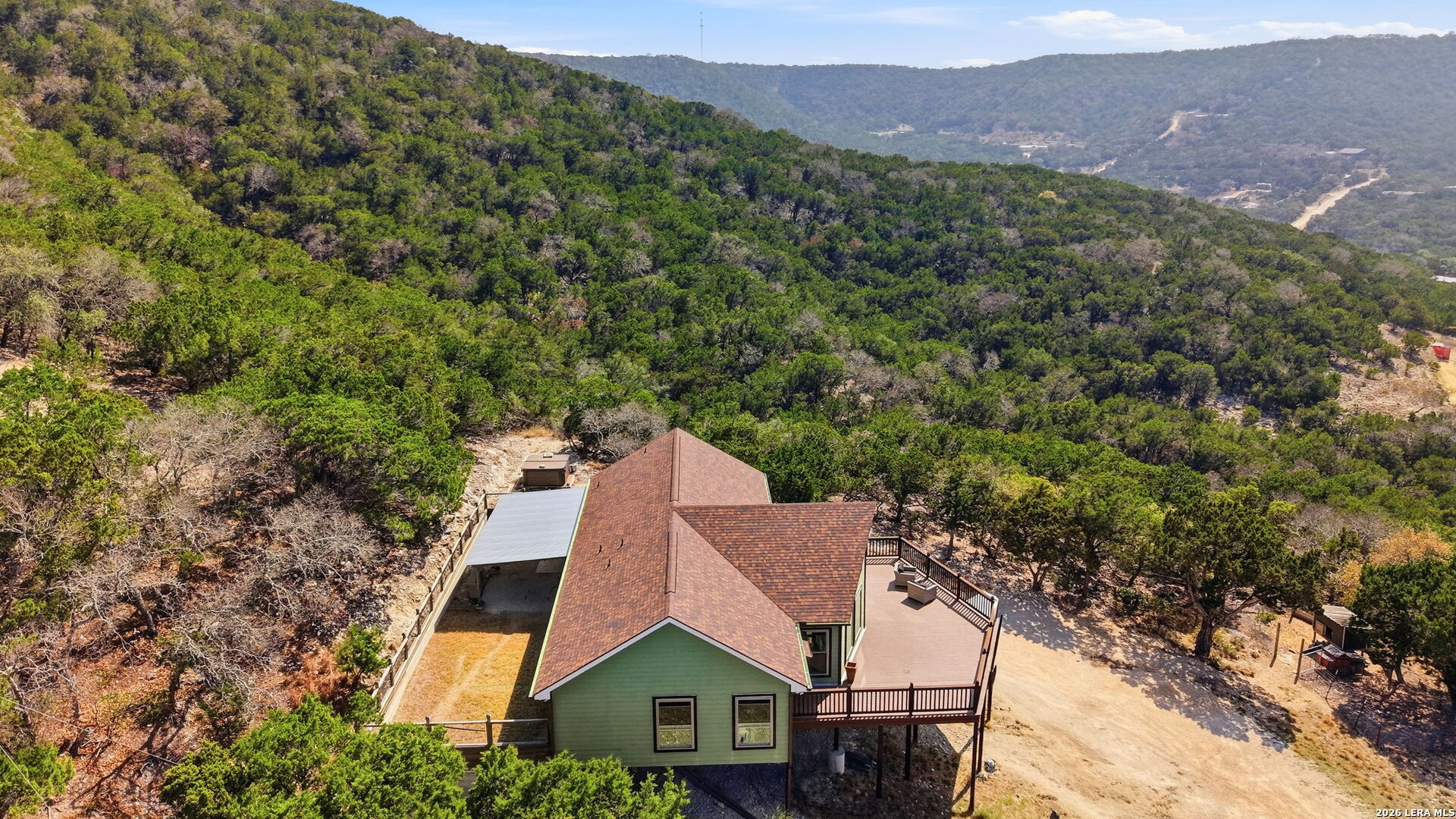 232 Doe Run Road Pipe Creek, TX 78063 - Photo 35 of 40 an aerial view of a house