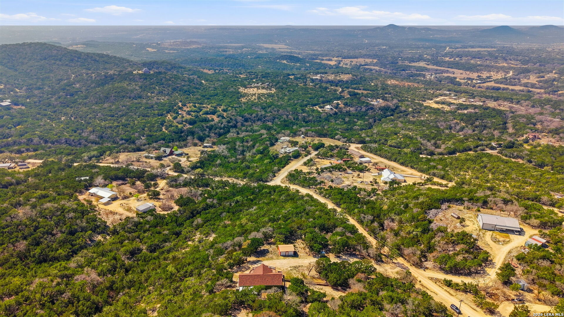 232 Doe Run Road Pipe Creek, TX 78063 - Photo 37 of 40 view of city and mountain