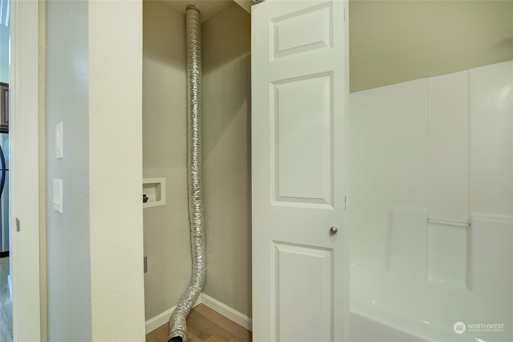 225 Logan Avenue South, Unit 108 Renton, WA 98057 - Photo 11 of 23 a bathroom with a mirror