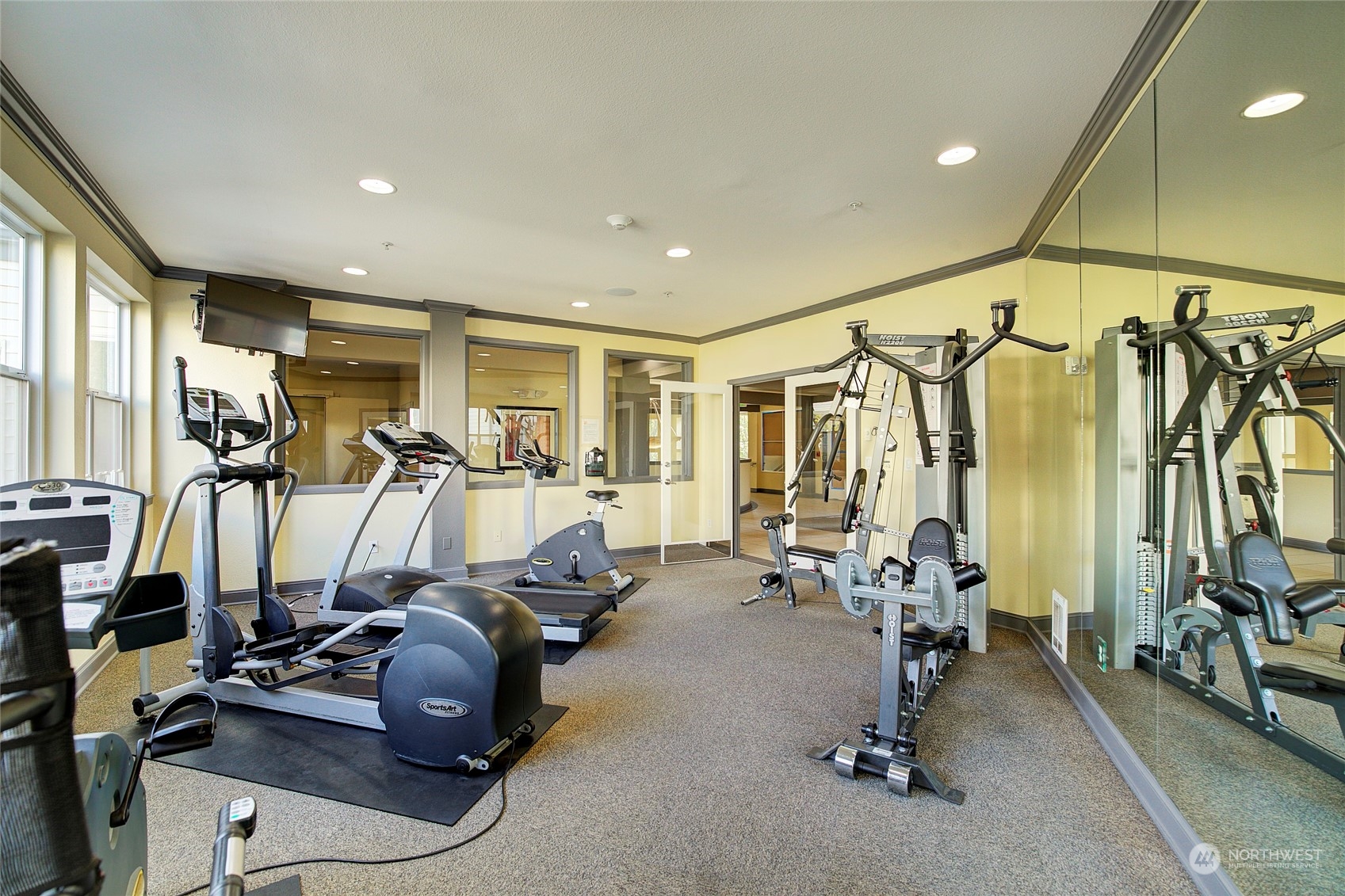225 Logan Avenue South, Unit 108 Renton, WA 98057 - Photo 20 of 23 a view of a room with gym equipment