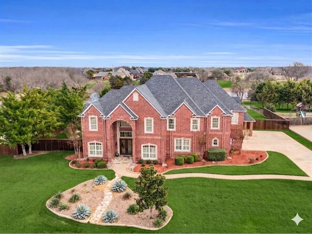 3530 Pleasantville Road Midlothian, TX 76065 - Photo 2 of 40 an aerial view of a house with a garden and trees
