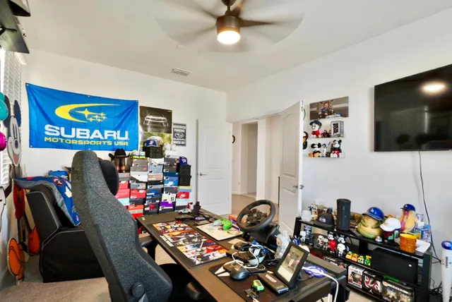 a bedroom that has a bed and a window