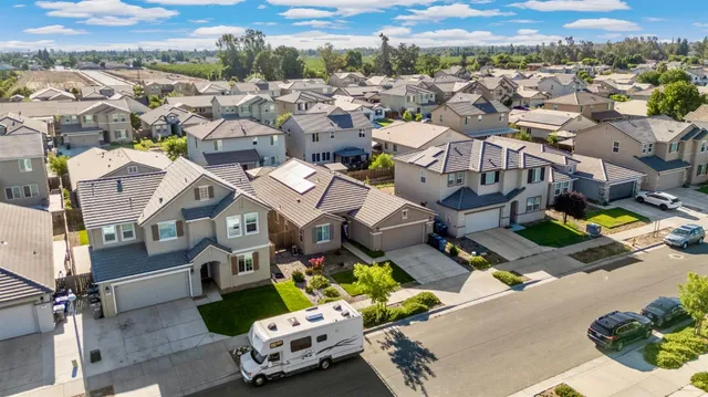 an aerial view of a city with lots of residential buildings