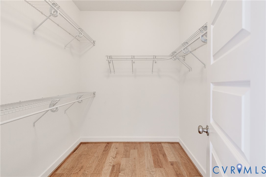 2512 Channelmark Court Chester, VA 23836 - Photo 30 of 36 One of two walk in closets in the primary bedroom.