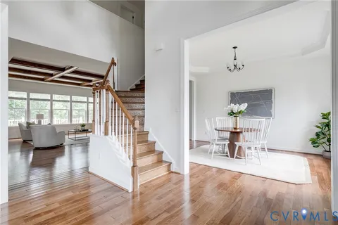 a view of a living room filled with furniture