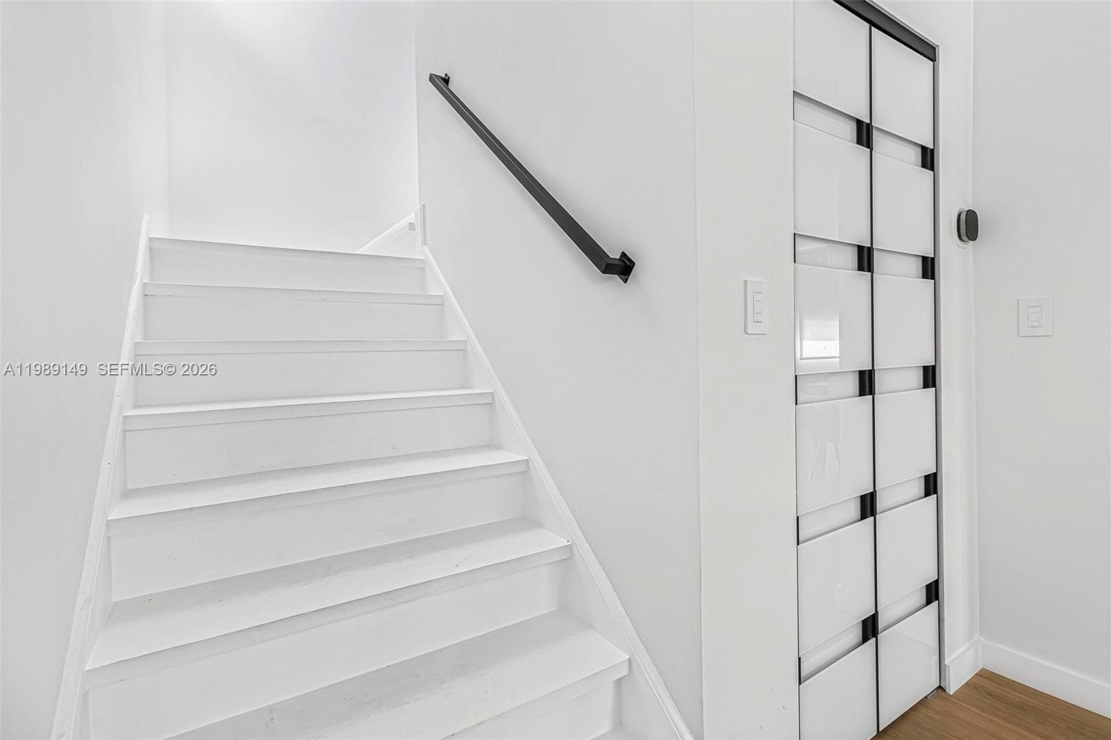 18490 Southwest 83rd Place Cutler Bay, FL 33157 - Photo 29 of 84 a view of staircase with white walls