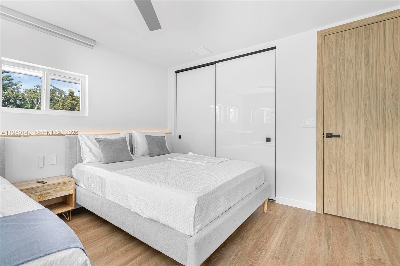 18490 Southwest 83rd Place Cutler Bay, FL 33157 - Photo 42 of 84 a large white bed in a white room