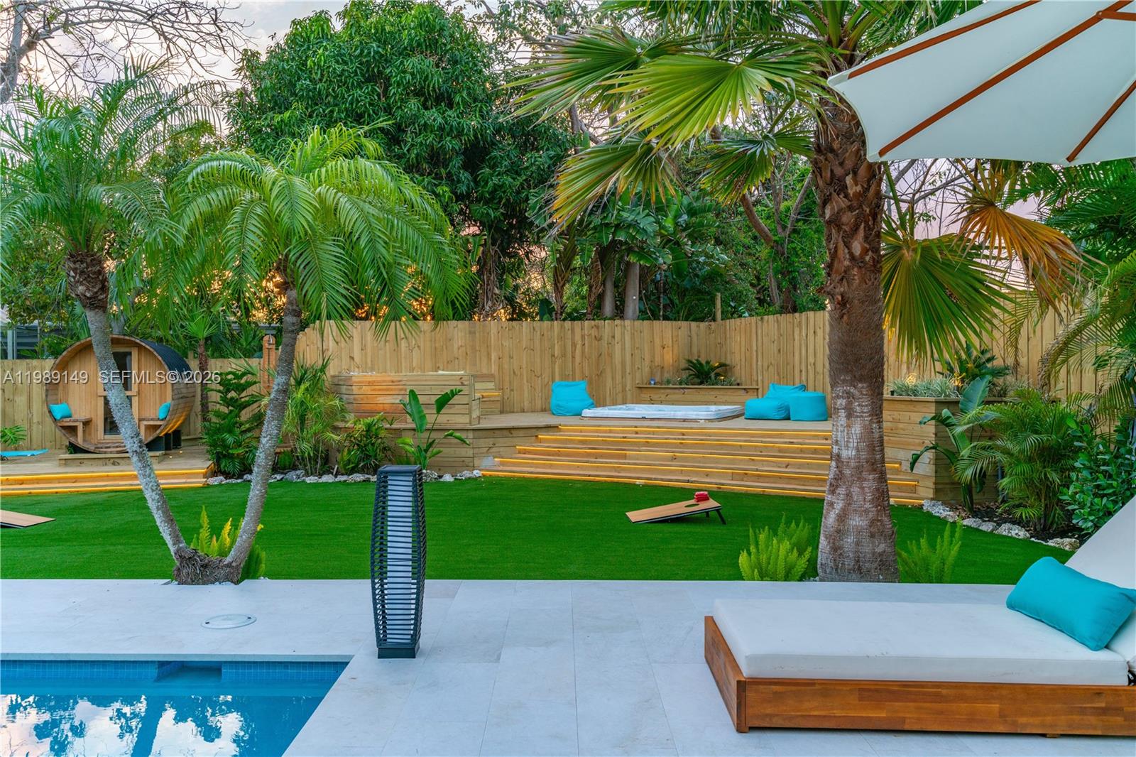 18490 Southwest 83rd Place Cutler Bay, FL 33157 - Photo 72 of 84 a view of yard with swimming pool and green space