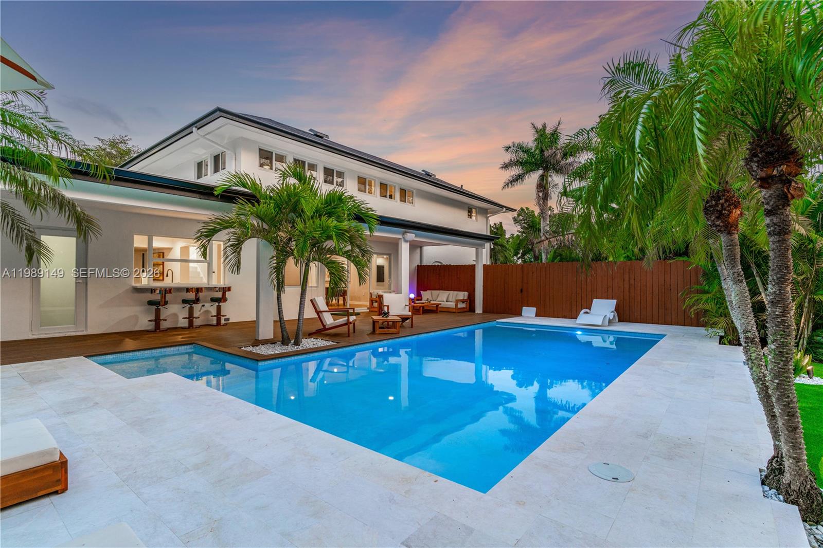 18490 Southwest 83rd Place Cutler Bay, FL 33157 - Photo 79 of 84 a front view of house with yard and outdoor seating