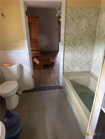 a view of a room with rack on the wall