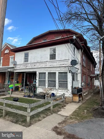 a view of a building with a patio