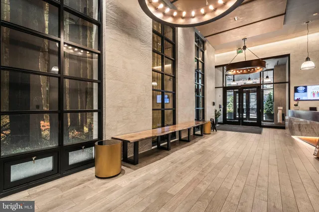 a view of staircase with a rug