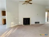 a view of a livingroom with a fireplace