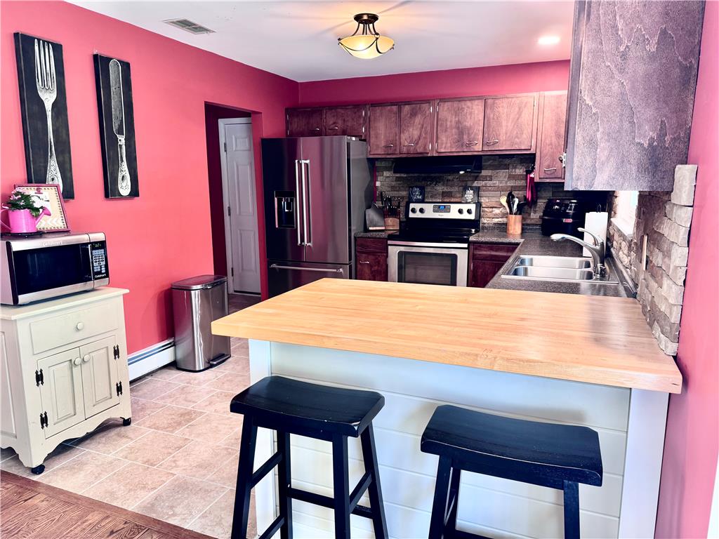 5334 Egypt Road Laurys Station, PA 18059 - Photo 15 of 55 A functional kitchen boasts ample counter space, rich cabinetry, and modern appliances for culinary endeavors.