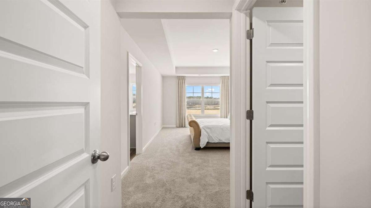 237 Sound Circle Stockbridge, GA 30281 - Photo 18 of 67 a bed room with a bed and a view of bedroom