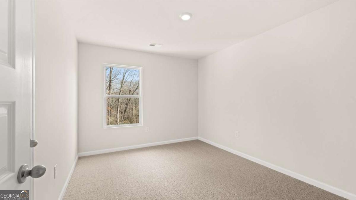 237 Sound Circle Stockbridge, GA 30281 - Photo 51 of 67 an empty room with a window