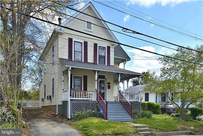 631 Ritchie Avenue Silver Spring, MD 20910 - Photo 2 of 30 a front view of a house with a porch