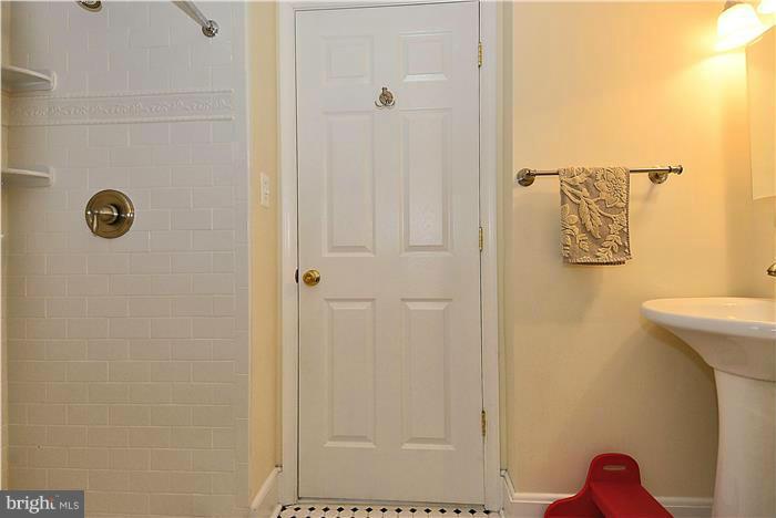 631 Ritchie Avenue Silver Spring, MD 20910 - Photo 13 of 30 a bathroom with a shower