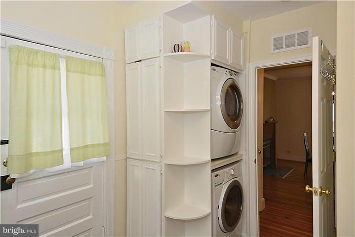 631 Ritchie Avenue Silver Spring, MD 20910 - Photo 16 of 30 a utility room with dryer and washer