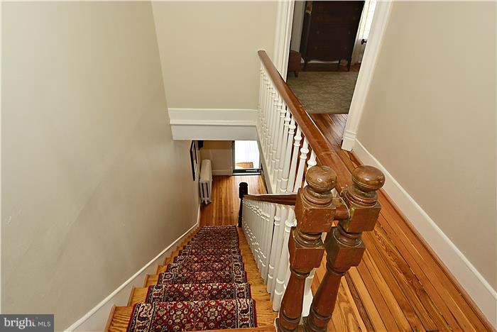 631 Ritchie Avenue Silver Spring, MD 20910 - Photo 19 of 30 a view of entryway with wooden floor