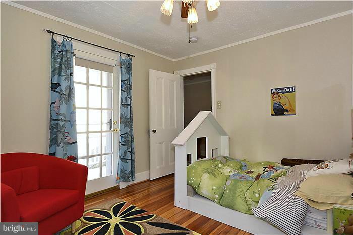 631 Ritchie Avenue Silver Spring, MD 20910 - Photo 22 of 30 a living room with furniture and a window