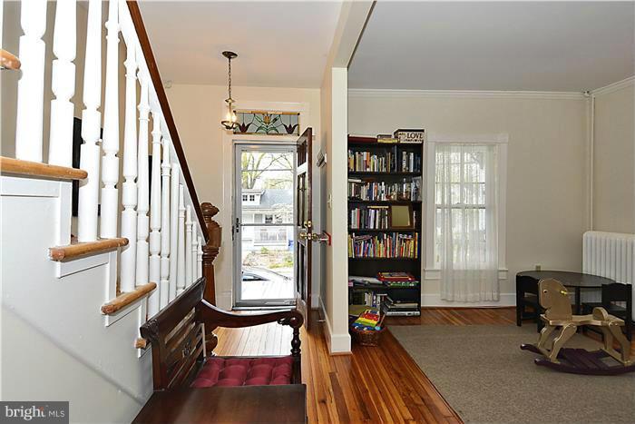 631 Ritchie Avenue Silver Spring, MD 20910 - Photo 6 of 30 a livingroom with furniture staircase and a living room