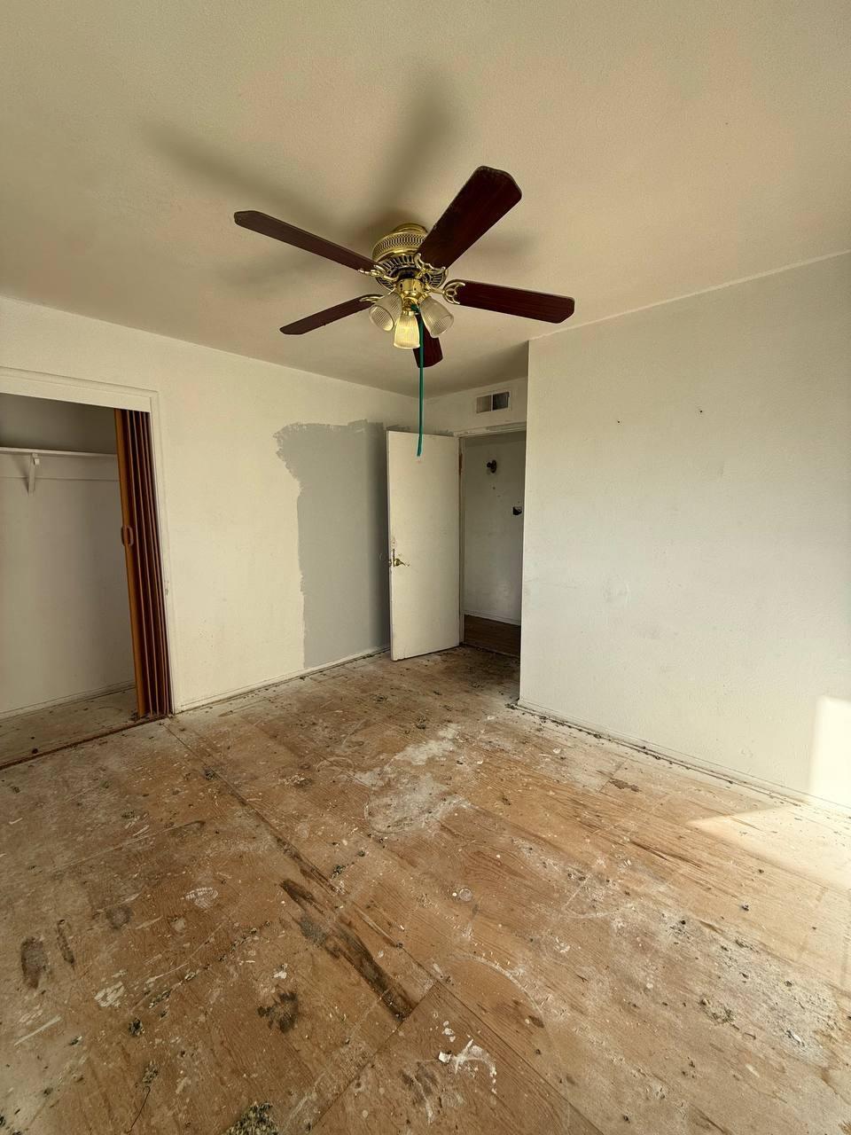 170 West Spring Lane Lemoore, CA 93245 - Photo 18 of 25 a view of a livingroom with a ceiling fan and window
