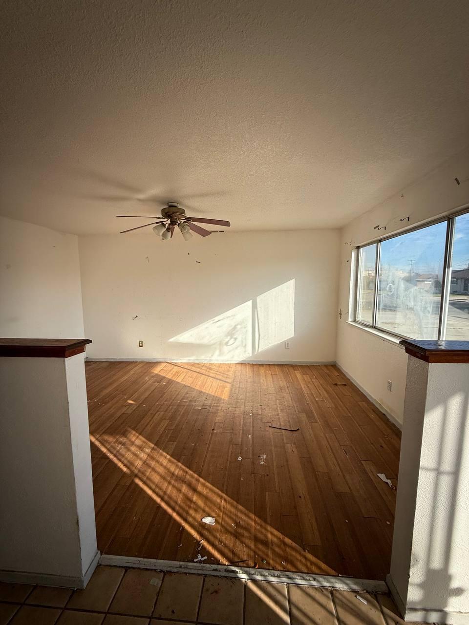 170 West Spring Lane Lemoore, CA 93245 - Photo 6 of 25 a view of a room with wooden floor