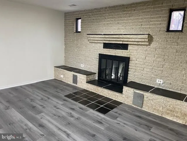 a living room with a fireplace