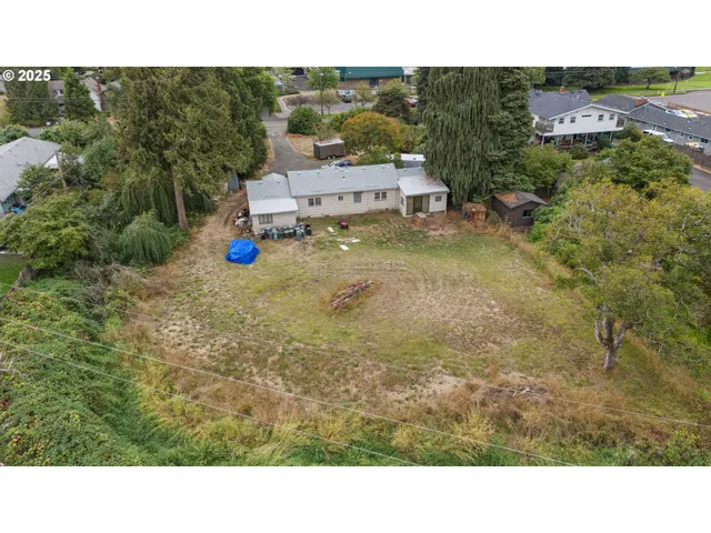 a picture of a park with an outdoor seating