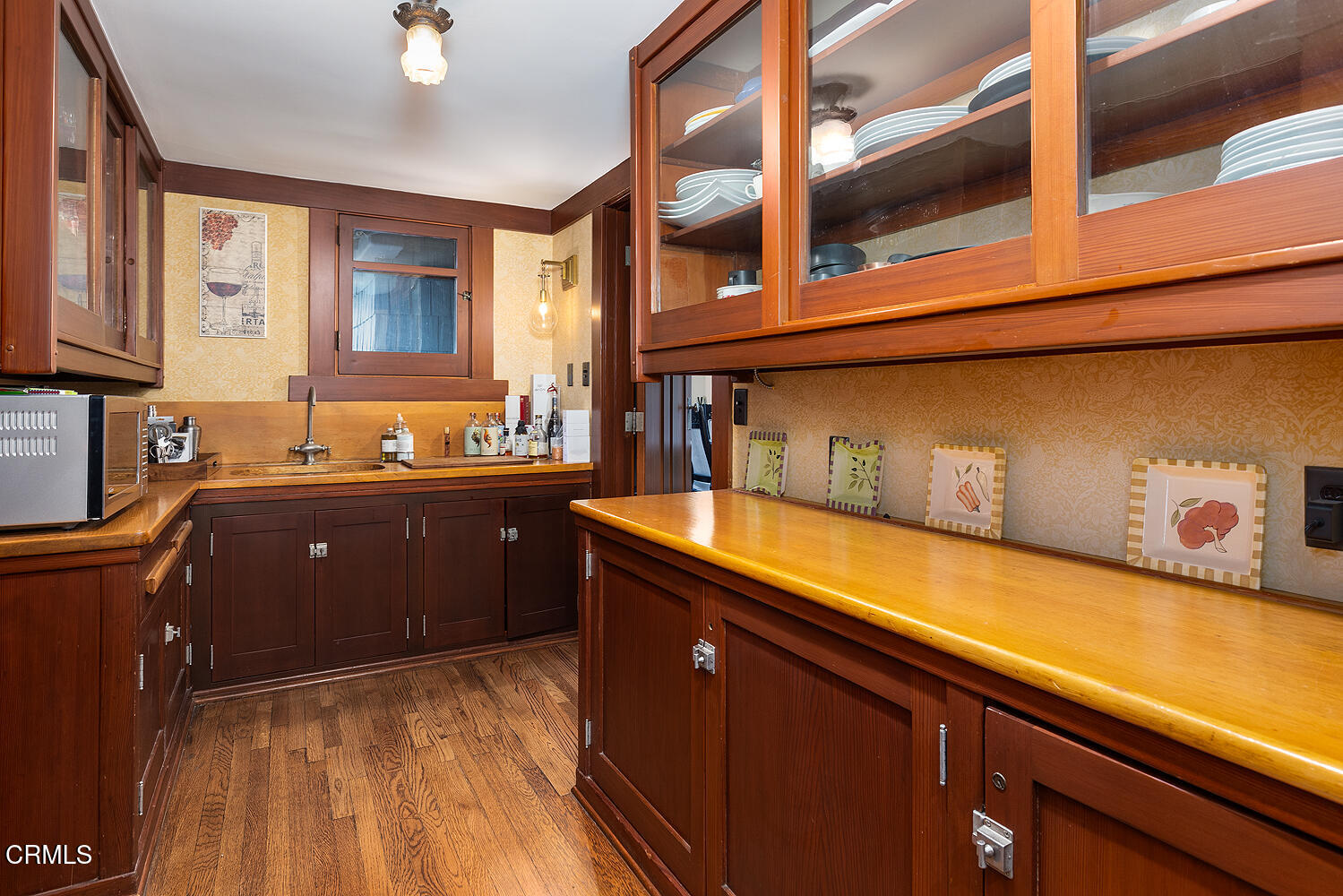 1344 Hillcrest Avenue Pasadena, CA 91106 - Photo 9 of 23 a kitchen with a sink and cabinets