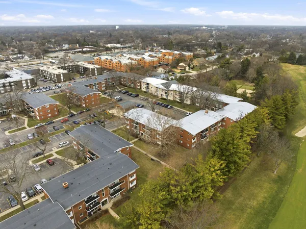 an aerial view of a city with lots of residential buildings