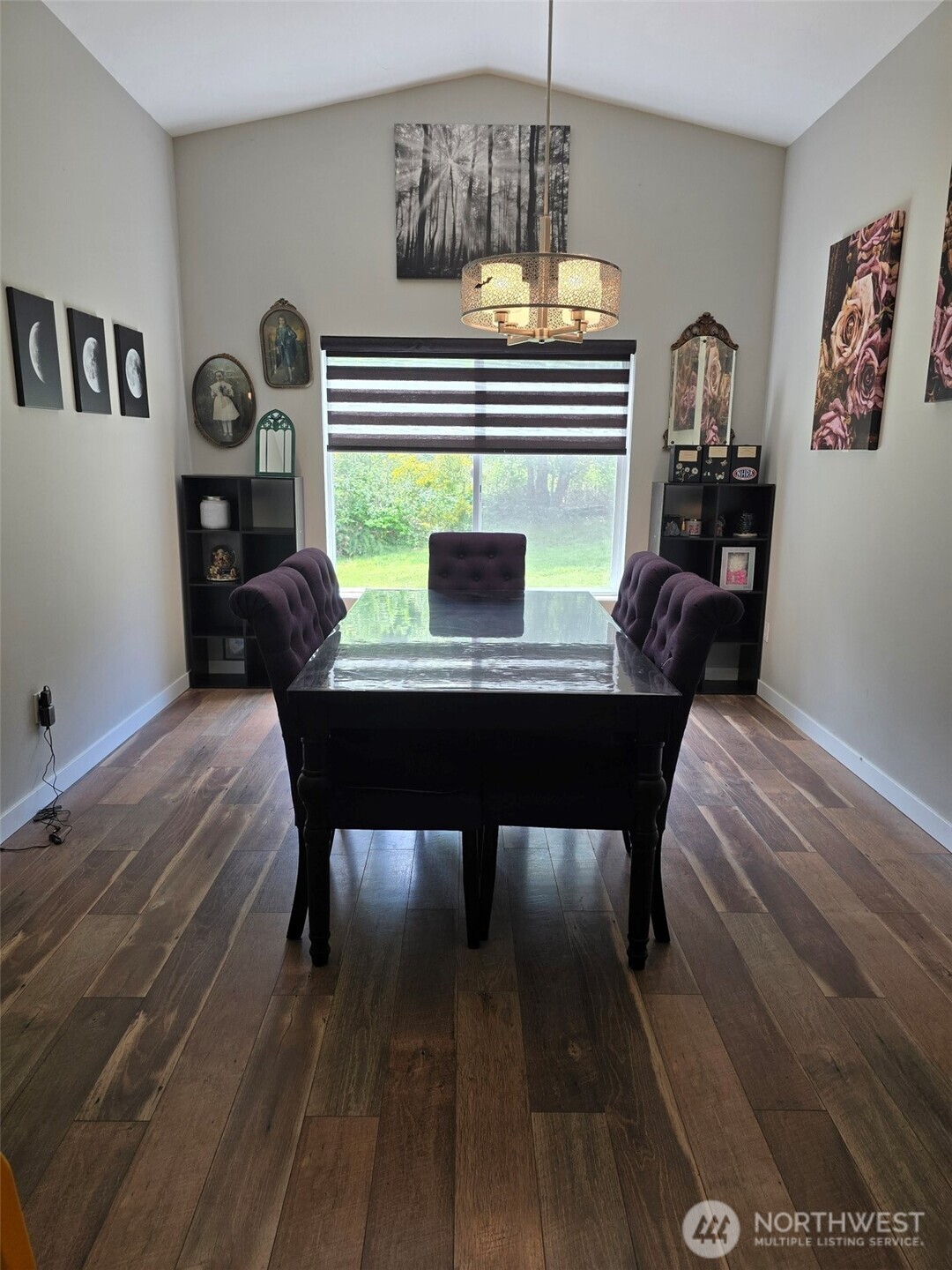 6611 Crescent Beach Road Northwest Vaughn, WA 98394 - Photo 13 of 17 a workspace with furniture window and wooden floor
