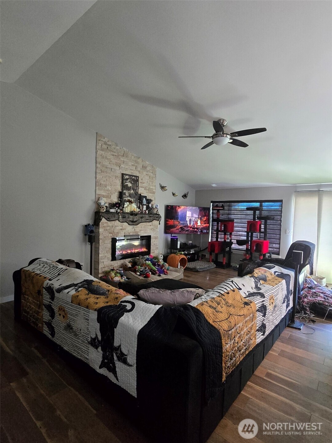 6611 Crescent Beach Road Northwest Vaughn, WA 98394 - Photo 17 of 17 a bed room with a bed and a chair