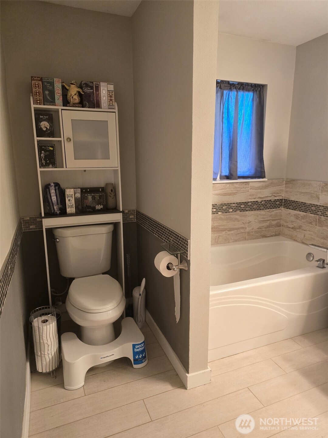6611 Crescent Beach Road Northwest Vaughn, WA 98394 - Photo 5 of 17 a bathroom with a toilet and a shower