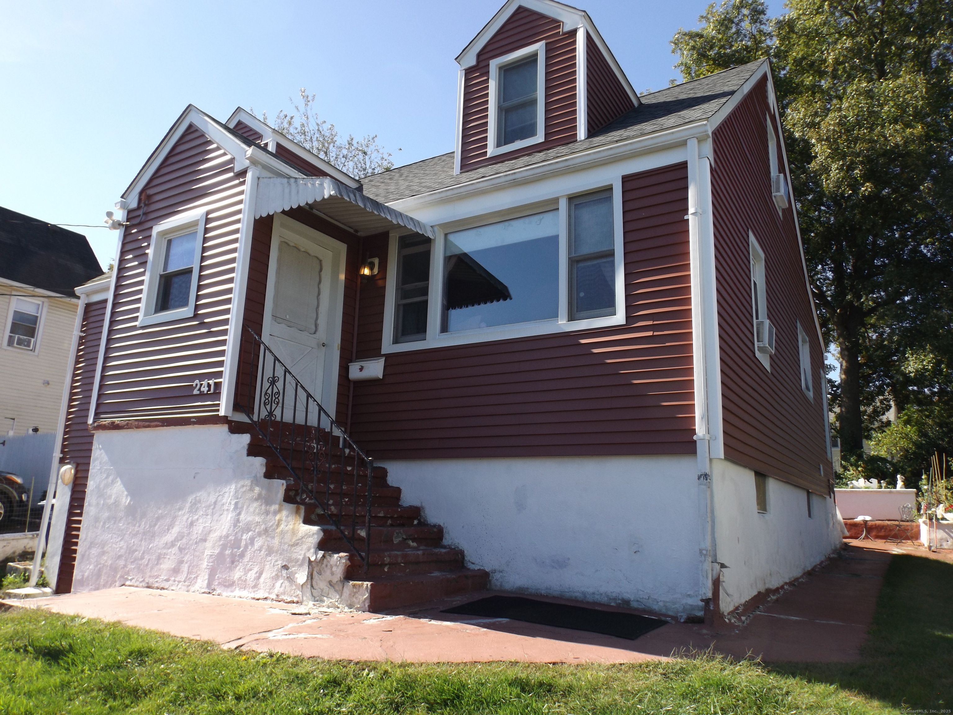 241 Sampson Street Bridgeport, CT 06606 - Photo 3 of 7 a view of a house with a yard
