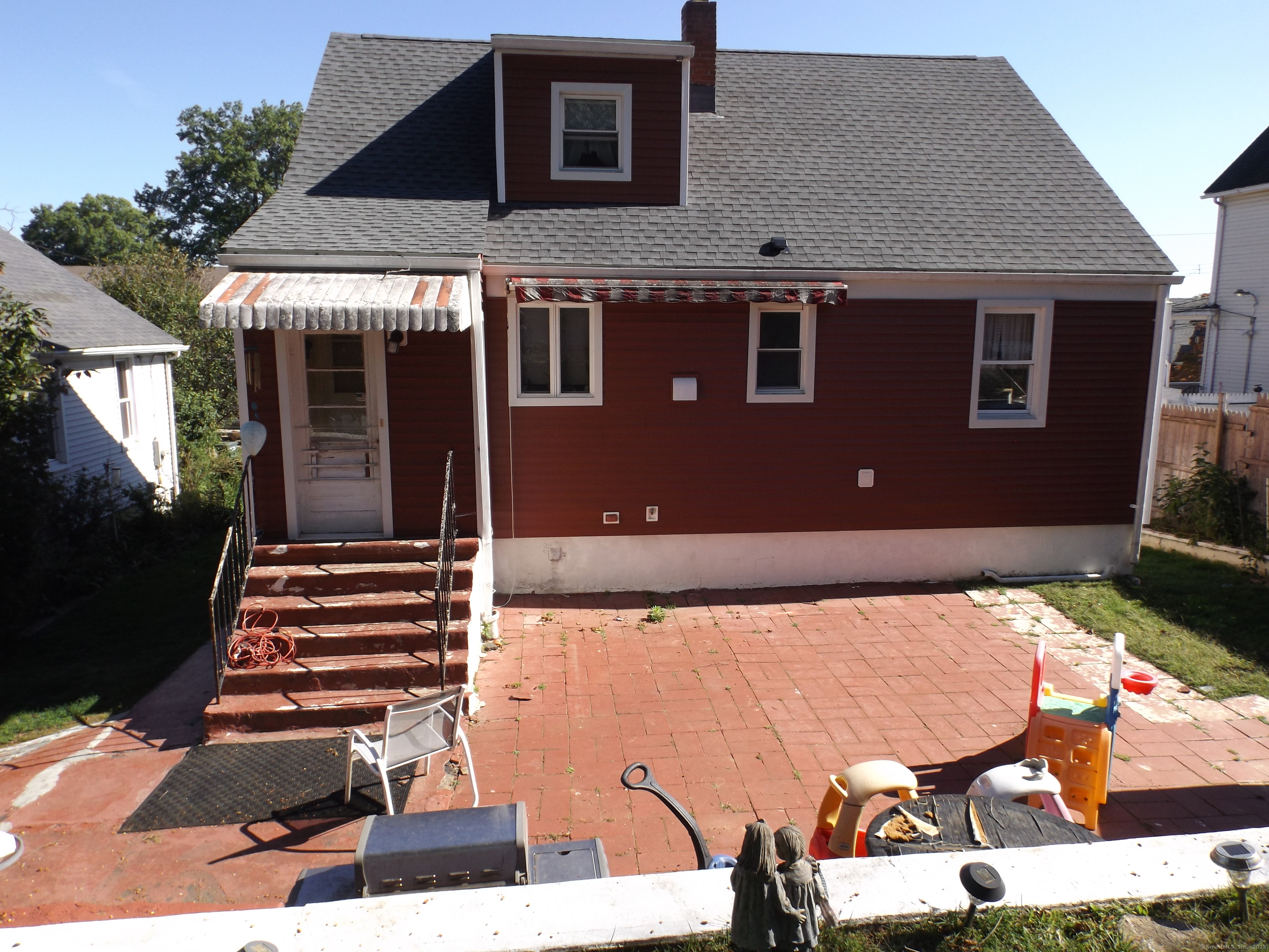 241 Sampson Street Bridgeport, CT 06606 - Photo 4 of 7 a front view of a house with a yard