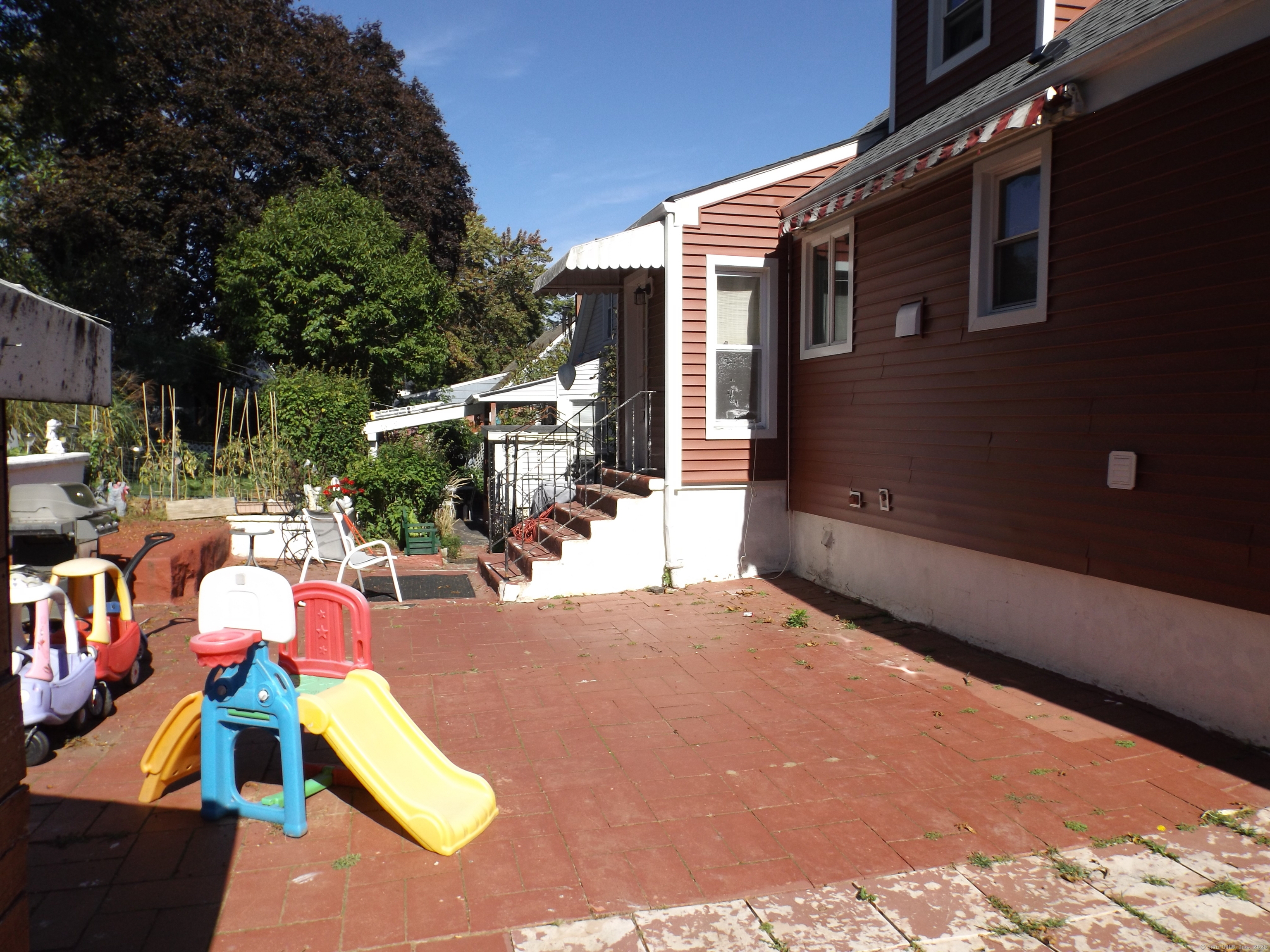 241 Sampson Street Bridgeport, CT 06606 - Photo 7 of 7 a view of outdoor space yard deck patio and outdoor kitchen
