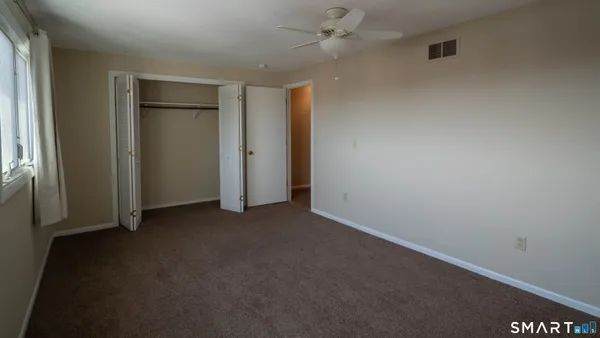 an empty room with windows