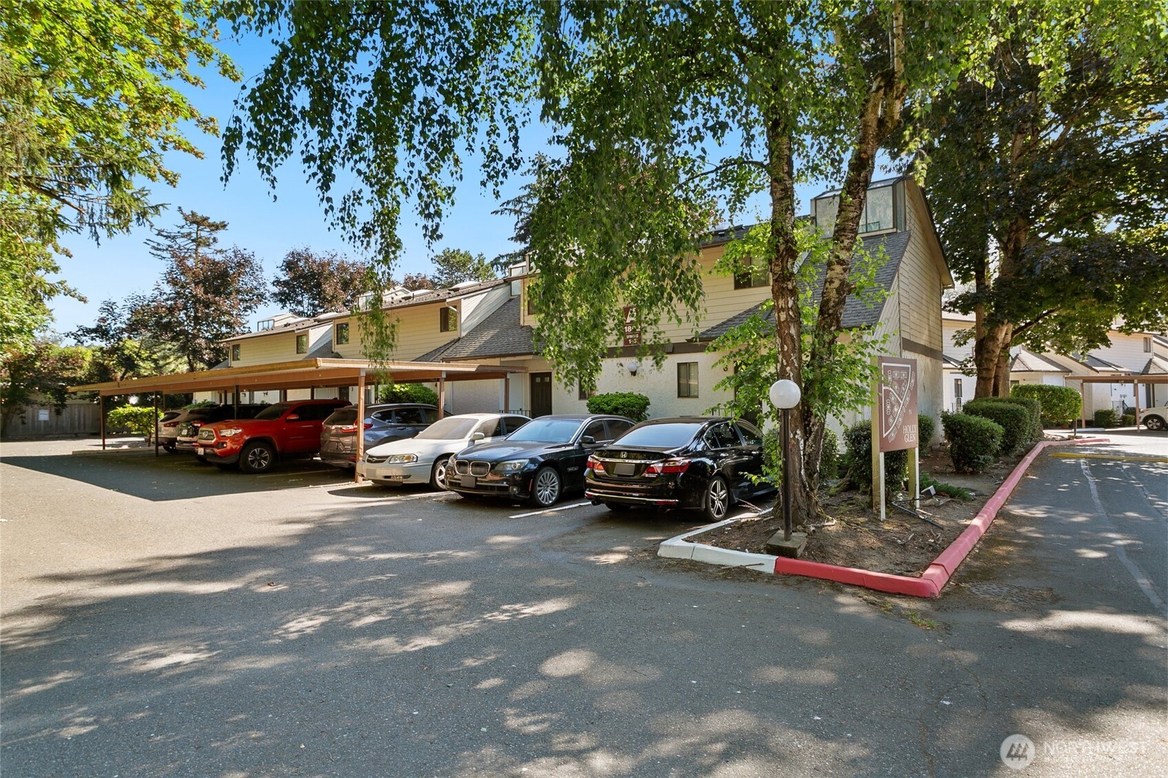 1802 Maple Lane, Unit A5 Kent, WA 98030 - Photo 21 of 27 a view of street with parked cars